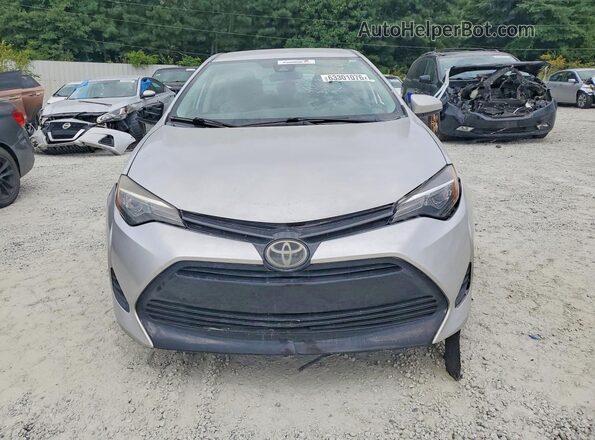 5YFBURHE3KP896868 2019 TOYOTA COROLLA Серебряный Вид сзади