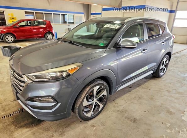 KM8J33A2XHU389033 2017 HYUNDAI TUCSON Gray Задня ліва чверть