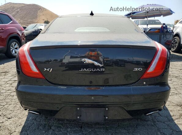 SAJWA1C74G8W03018 2016 JAGUAR XJ Black Вид салону спереду