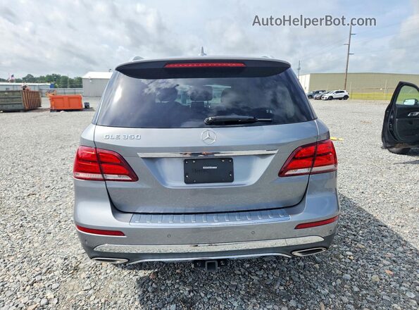 4JGDA5JB1GA699957 2016 MERCEDES-BENZ GLE-CLASS Silver Widok wnętrza z przodu