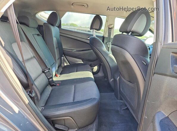 KM8J3CA26GU050249 2016 HYUNDAI TUCSON Gray უკანა სალონის ხედი