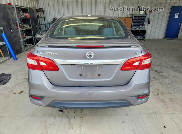 3N1AB7AP6KY315982 2019 NISSAN SENTRA Серый Вид салона спереди