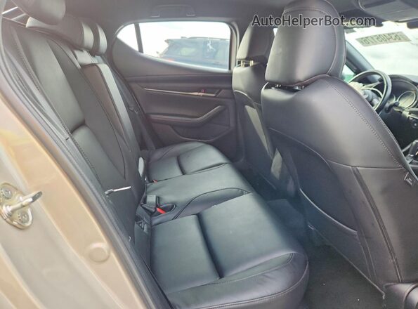 JM1BPAKM7R1713124 2024 MAZDA 3 Tan Vista interior trasera
