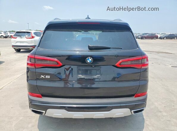 5UXCR6C5XKLL21718 2019 BMW X5 Black Front interior view
