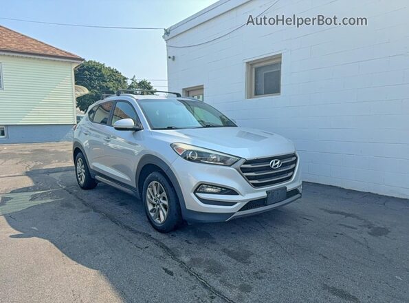 KM8J3CA29GU192143 2016 HYUNDAI TUCSON Silver Tył lewy