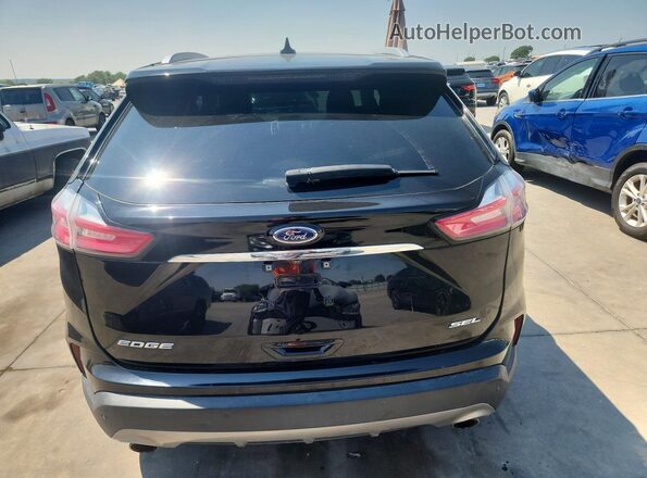 2FMPK3J98LBB47883 2020 FORD EDGE Черный Вид салона спереди