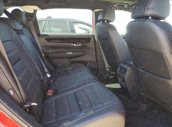 7FARS6H95SE033365 2025 HONDA CR-V Red Vista interior trasera