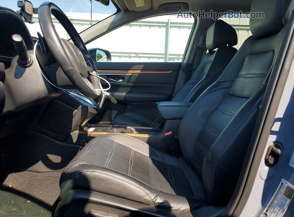 7FART6H94ME034779 2021 HONDA CR-V Blue Vista interior delantera