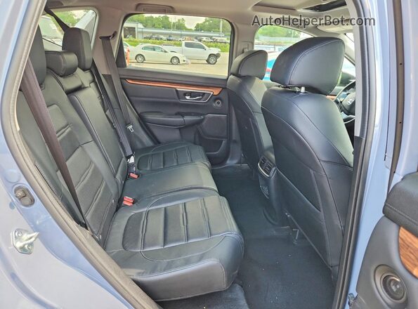 7FART6H94ME034779 2021 HONDA CR-V Blue Vista interior trasera