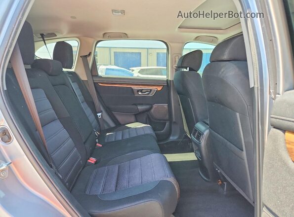 7FARW1H55LE029340 2020 HONDA CR-V Silver Rear interior view
