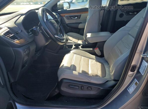 7FARW1H80JE015403 2018 HONDA CR-V Silver Front interior view