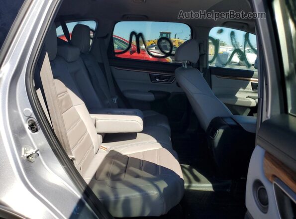 7FARW1H80JE015403 2018 HONDA CR-V Silver Rear interior view