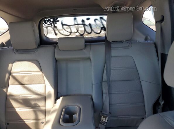 7FARW1H80JE015403 2018 HONDA CR-V Silver Rear seats view