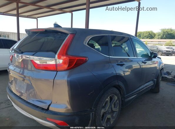 7FARW1H82JE041887 2018 HONDA CR-V Gray Vista interior trasera