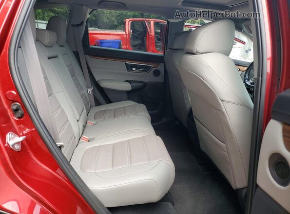 7FARW1H83ME010216 2021 HONDA CR-V Red Widok wnętrza z tyłu