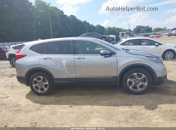 7FARW1H86HE003928 2017 HONDA CR-V Silver Вид задньої частини салону