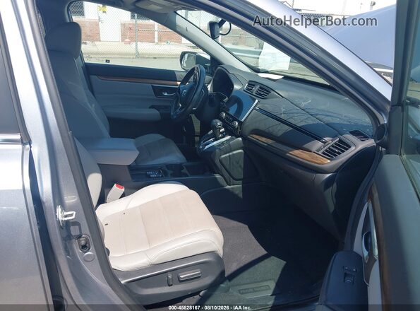 7FARW1H89HE009934 2017 HONDA CR-V Серебряный Вид салона спереди