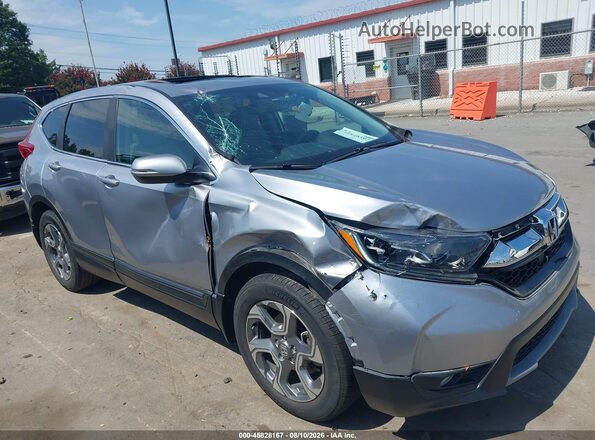 7FARW1H89HE009934 2017 HONDA CR-V Серебряный Вид задней части салона