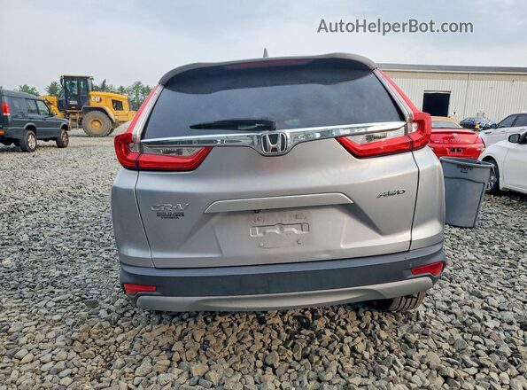 7FARW2H56KE056762 2019 HONDA CR-V Silver Հետևի տեսք