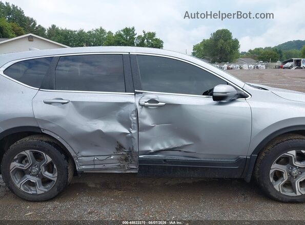 7FARW2H57JE046241 2018 HONDA CR-V Gray Vista interior trasera