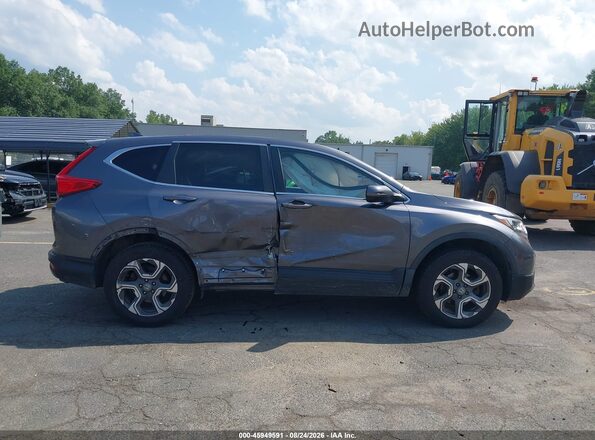 7FARW2H58JE011613 2018 HONDA CR-V Gray Vista interior trasera