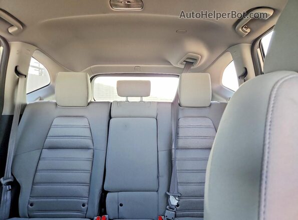 7FARW2H5XJE012231 2018 HONDA CR-V Silver Rear seats view