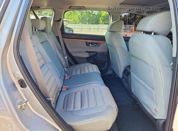 7FARW2H5XJE012231 2018 HONDA CR-V Silver Rear interior view