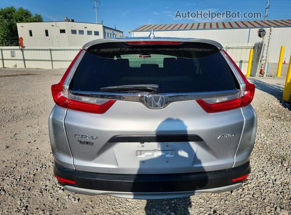 7FARW2H5XJE012231 2018 HONDA CR-V Silver Rear view