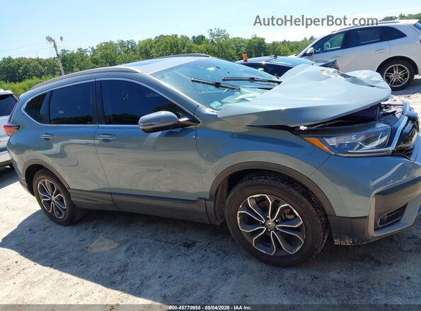 7FARW2H83NE018212 2022 HONDA CR-V Light Blue Widok wnętrza z tyłu