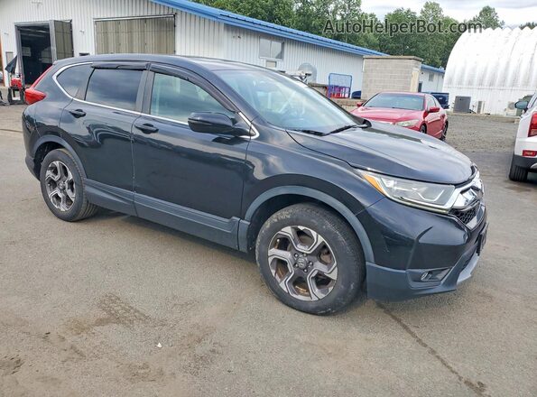 7FARW2H85JE017590 2018 HONDA CR-V Black Հետևի նստատեղերի տեսք