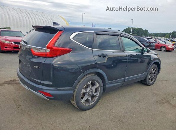 7FARW2H85JE017590 2018 HONDA CR-V Black Սարքավորումների վահանակի տեսք
