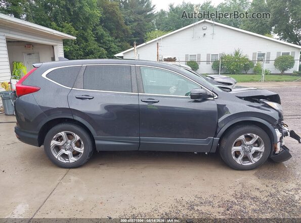 7FARW2H89JE010755 2018 HONDA CR-V Gray Widok wnętrza z tyłu