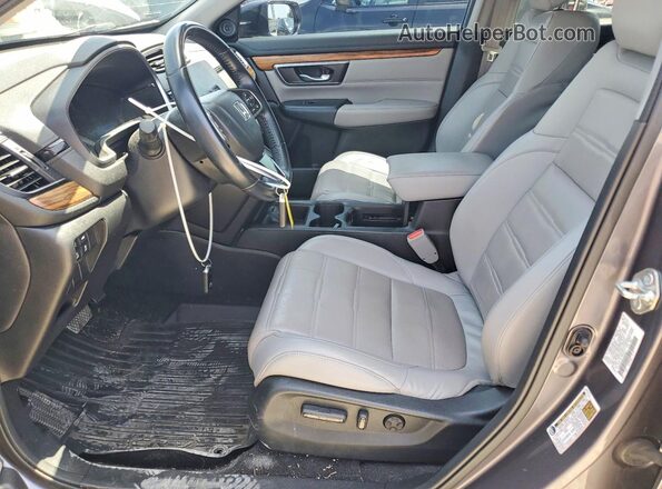 7FARW2H9XJE093881 2018 HONDA CR-V Gray წინა სალონის ხედი