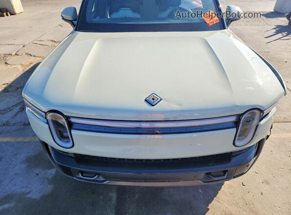 7FCTGCAA1SN041349 2025 RIVIAN R1T Gray Вид задньої частини салону