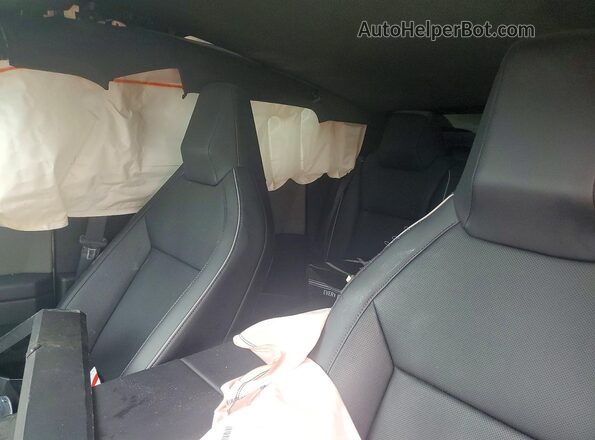 7G2CEHED9SA069292 2025 TESLA CYBERTRUCK White Widok wnętrza z tyłu
