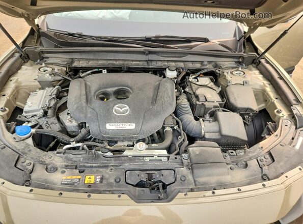 7MMVABXY2PN134063 2023 MAZDA CX-5 Tan Vista del compartimento del motor