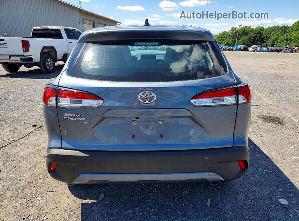 7MUAAAAG1RV104726 2024 TOYOTA COROLLA Blue Rear view