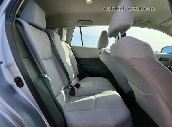 7MUAAAAG8RV099086 2024 TOYOTA COROLLA Silver Rear interior view