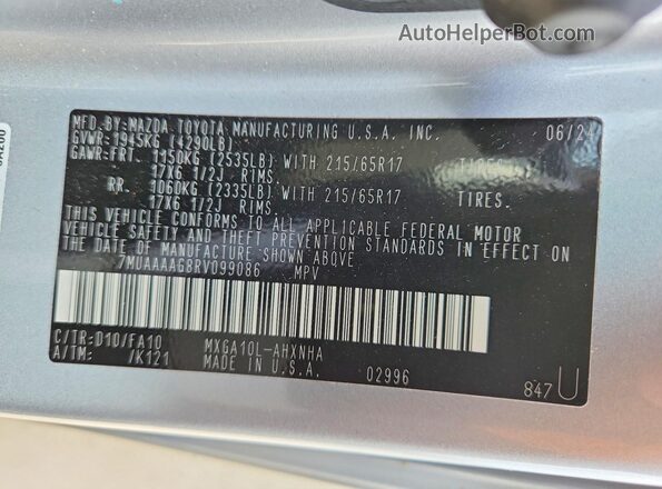 7MUAAAAG8RV099086 2024 TOYOTA COROLLA Silver VIN sticker view