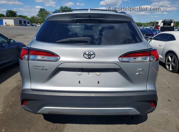 7MUBAABG0PV078877 2023 TOYOTA COROLLA Silver Вид ззаду