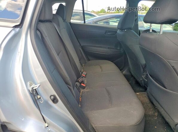 7MUBAABG0PV078877 2023 TOYOTA COROLLA Silver Вид задніх сидінь