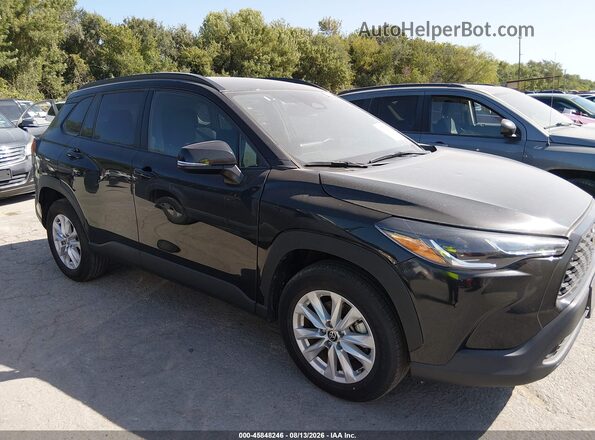 7MUCAABG6RV082066 2024 TOYOTA COROLLA CROSS Black Vista interior trasera