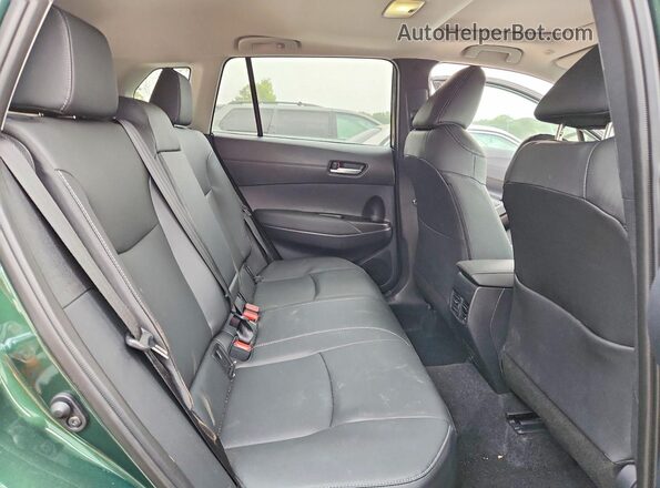 7MUDAABG0SV143440 2025 TOYOTA COROLLA Green Rear interior view