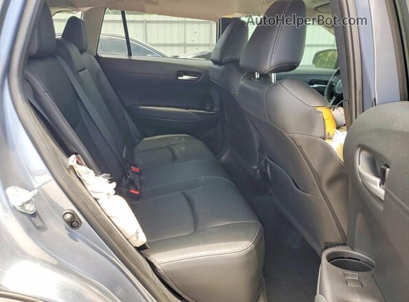 7MUDAABG7RV080654 2024 TOYOTA COROLLA Blue Widok wnętrza z tyłu