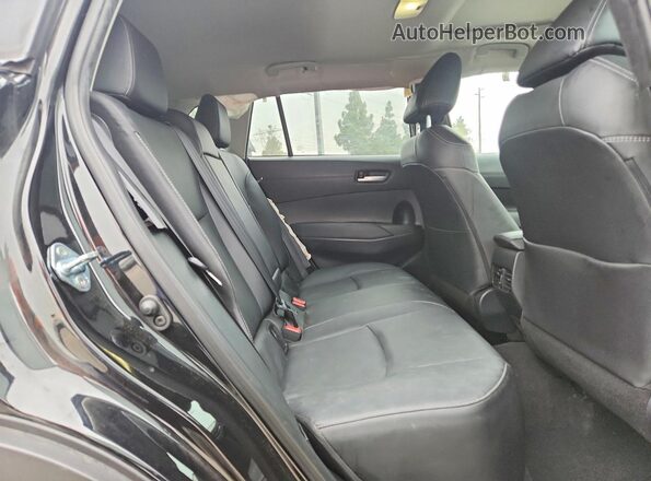 7MUDAABG8PV063326 2023 TOYOTA COROLLA Black Vista interior trasera