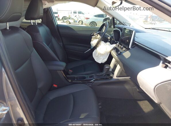 7MUDAABG9PV072083 2023 TOYOTA COROLLA CROSS Light Blue Vista interior delantera