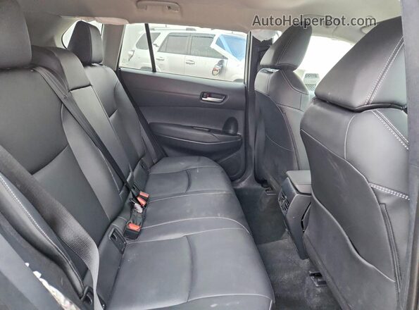 7MUEAAAG5RV100728 2024 TOYOTA COROLLA Gray Вид задньої частини салону