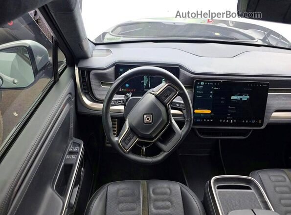 7PDSGABA4PN019950 2023 RIVIAN R1S Gray Front interior view