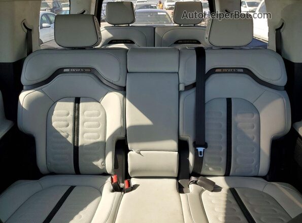 7PDSGABA9PN010077 2023 RIVIAN R1S Gray Rear seats view