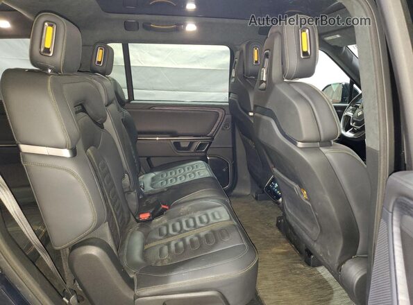 7PDSGABAXPN021332 2023 RIVIAN R1S Black Rear interior view